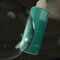 a bottle of soap with bubbles in it